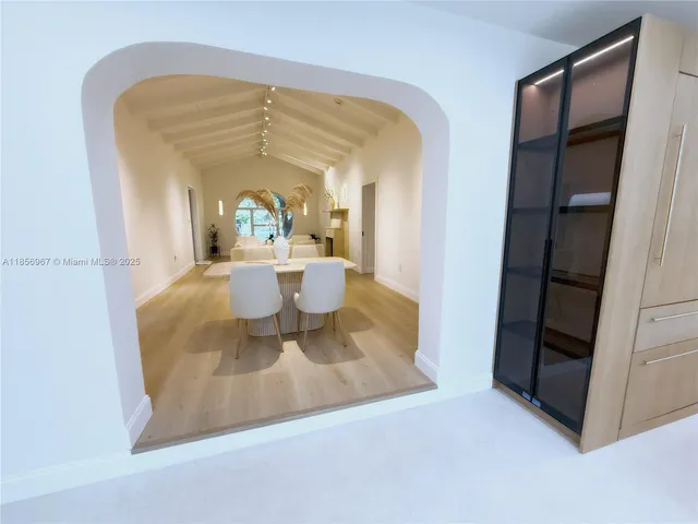 a view of a living room with a baby crib