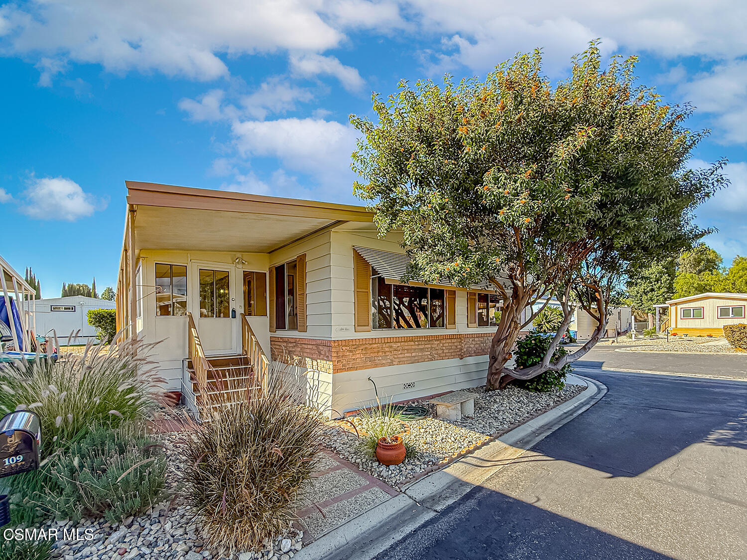 6480 Katherine Street, Unit 109 Simi Valley, CA 93063 - Photo 1 of 29 a view of a house with backyard
