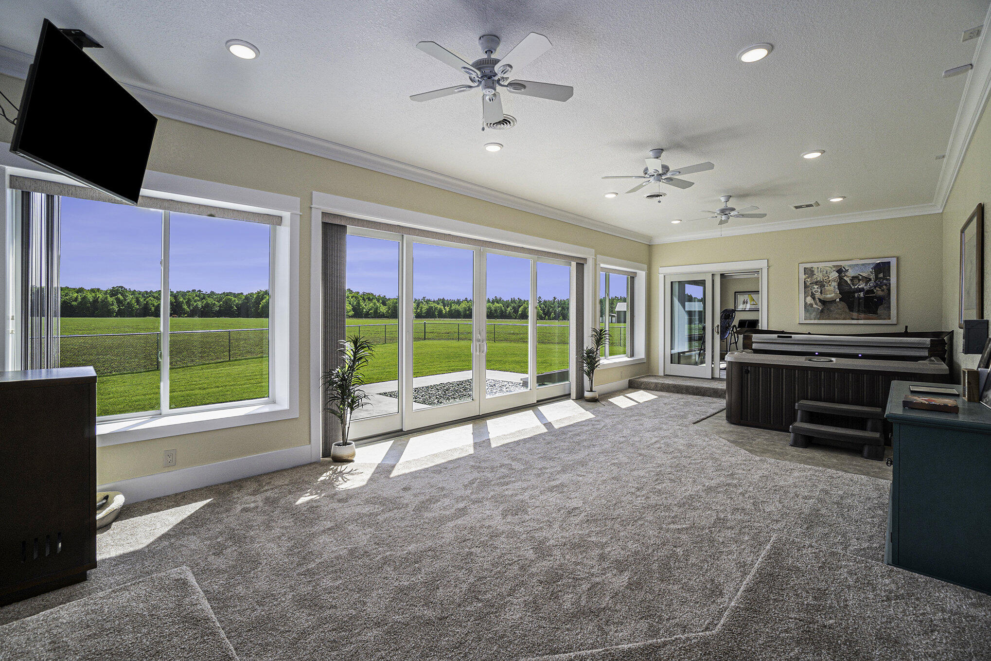 5859 Potter Road Onekama, MI 49675 - Photo 19 of 85 4 season rec room with hot tub