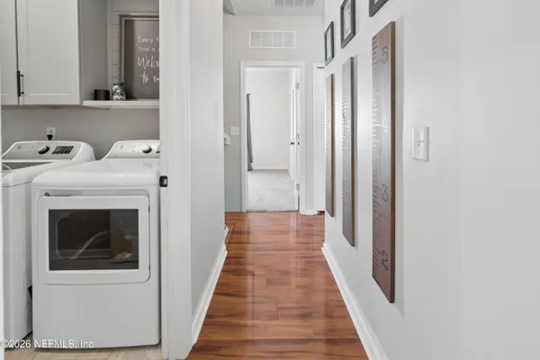 a utility room with dryer and washer