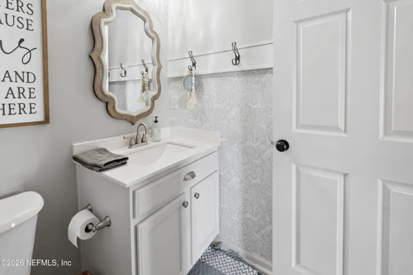 a bathroom with a sink and a bathtub