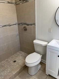 2158 Beecher Road Southwest, Unit A Atlanta, GA 30311 - Photo 14 of 21 a white toilet sitting next to a shower