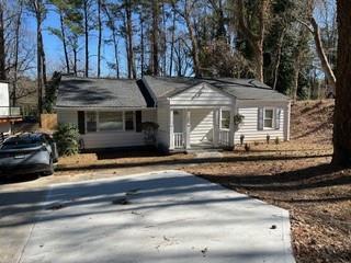 2158 Beecher Road Southwest, Unit A Atlanta, GA 30311 - Photo 3 of 21 a front view of a house with a yard