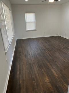 2158 Beecher Road Southwest, Unit A Atlanta, GA 30311 - Photo 6 of 21 an empty room with wooden floor and windows