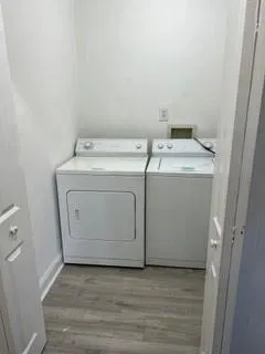 a utility room with dryer and washer