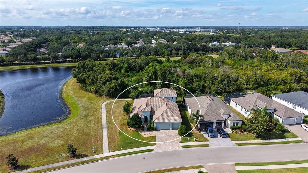 318 Ragdoll Run Bradenton, FL 34212 - Photo 62 of 87 an aerial view of residential houses with outdoor space and swimming pool