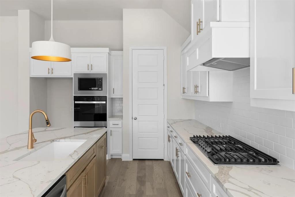 3135 Fisher Road Rockwall, TX 75032 - Photo 10 of 35 The Adley B Kitchen