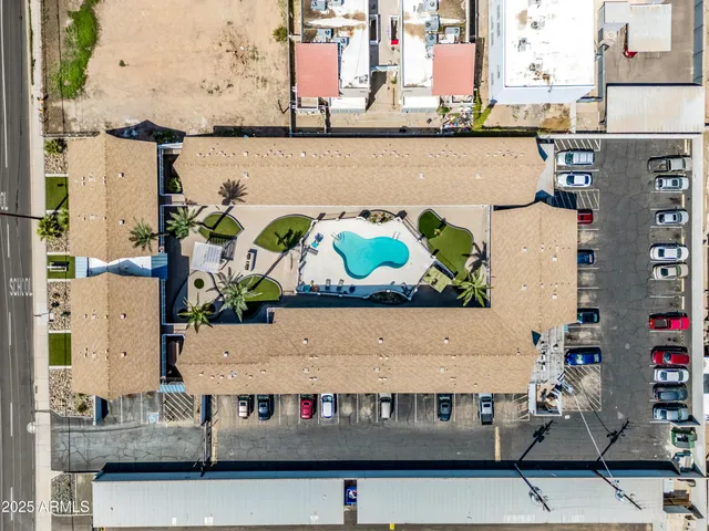 an aerial view of a building with outdoor space