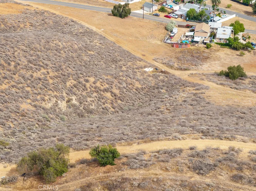 0 Ridge Lake Lake Elsinore, CA 92530 - Photo 8 of 8 a view of a dirt yard with a road