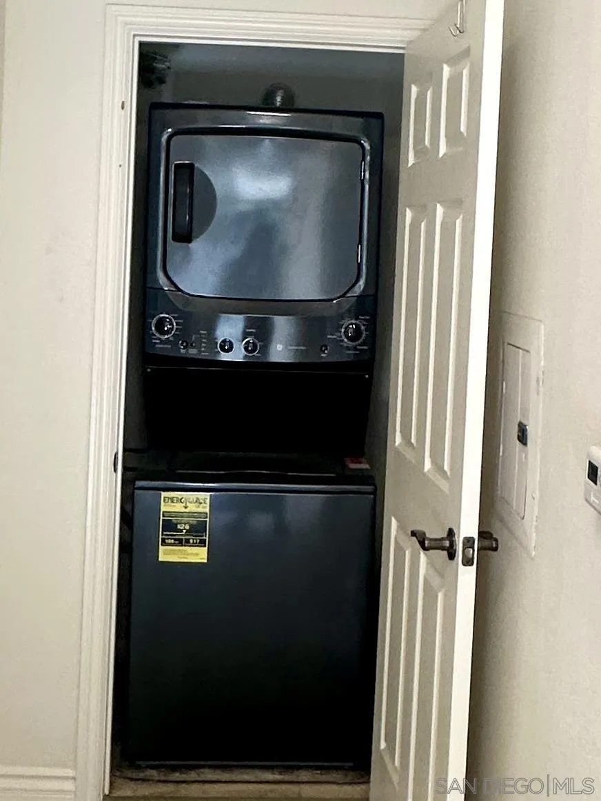 9263 Regents Road, Unit B204 La Jolla, CA 92037 - Photo 13 of 17 a view of washer and dryer
