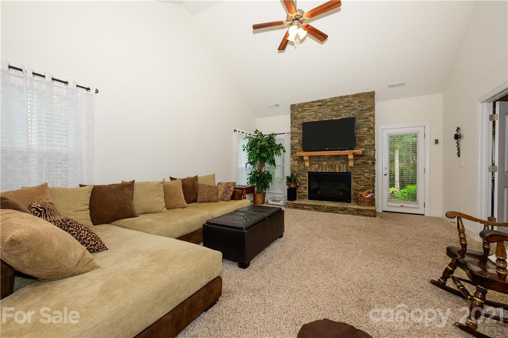 3028 Fallondale Road Waxhaw, NC 28173 - Photo 14 of 29 a living room with furniture and a fireplace