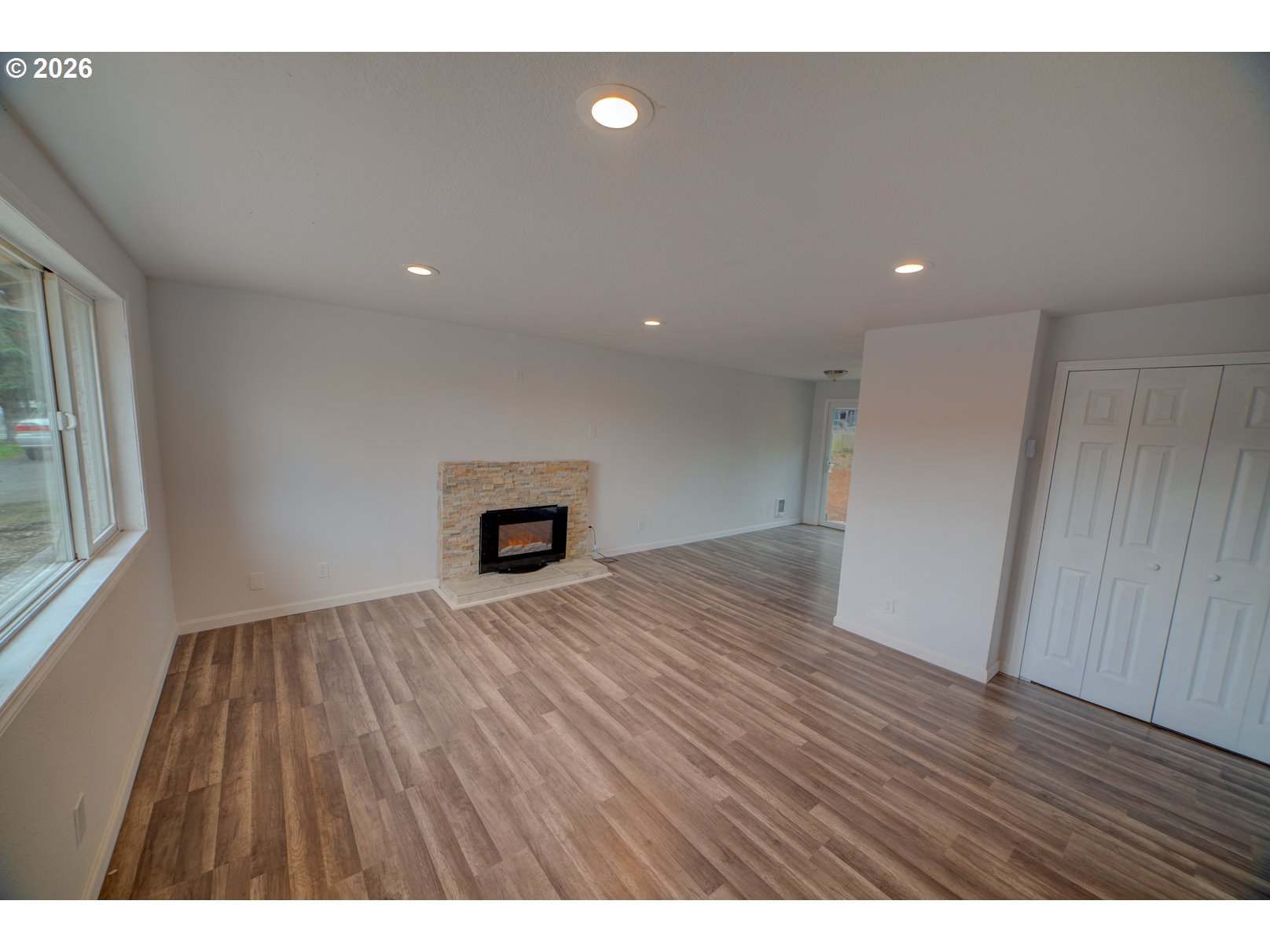 3825 Southwest 198th Avenue Beaverton, OR 97078 - Photo 16 of 23 a view of empty room with wooden floor