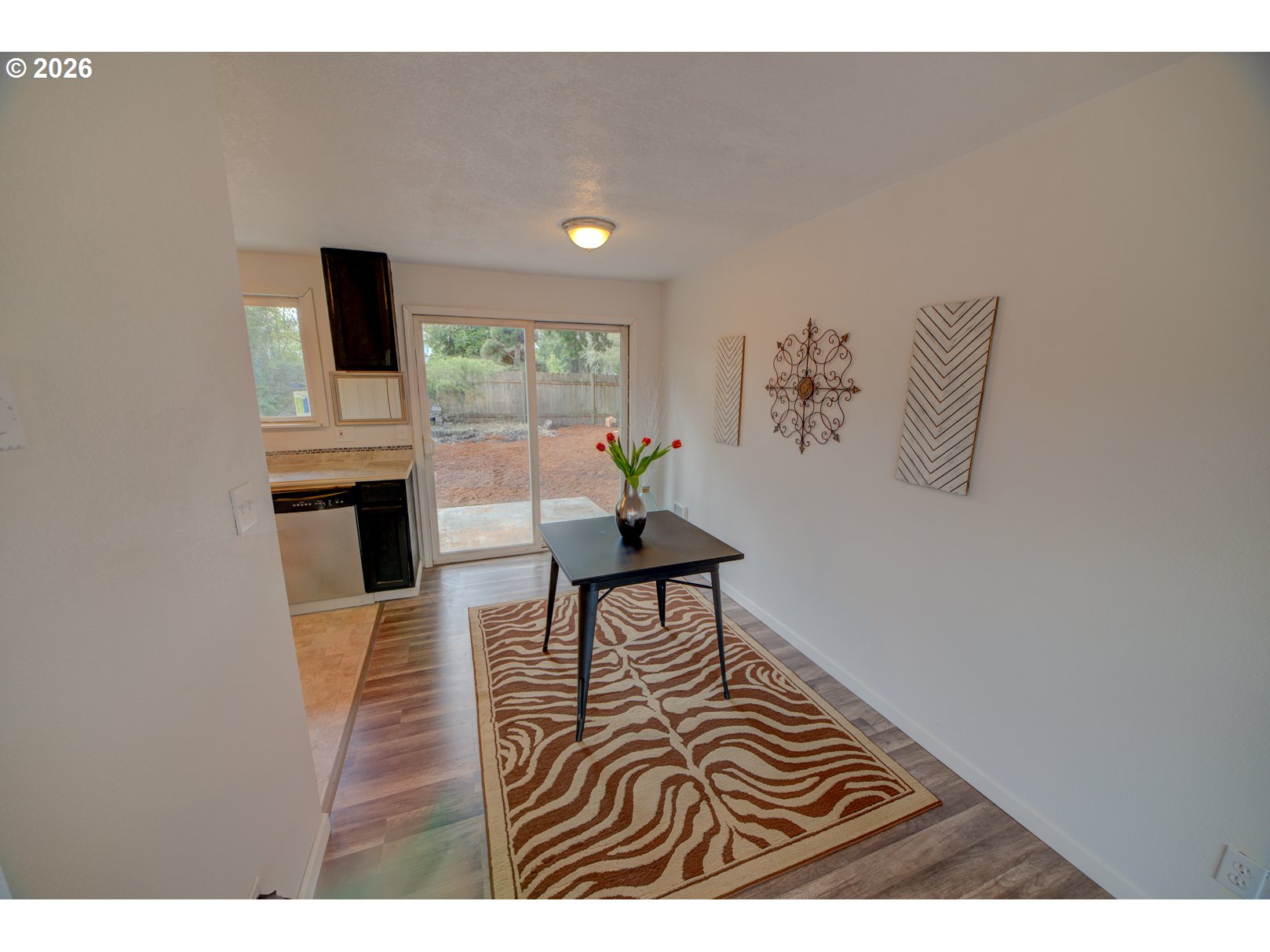 3825 Southwest 198th Avenue Beaverton, OR 97078 - Photo 21 of 23 a living room with furniture and a table