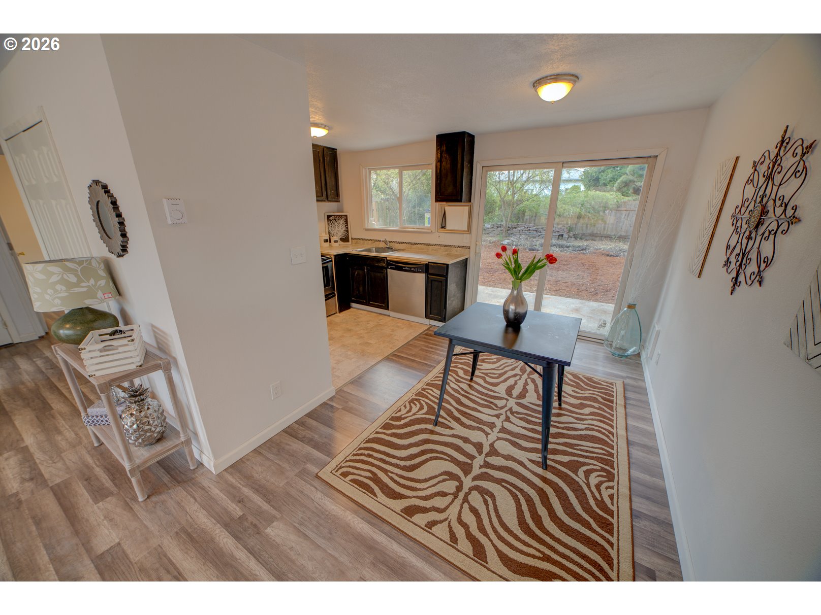 3825 Southwest 198th Avenue Beaverton, OR 97078 - Photo 22 of 23 a living room with furniture and a flat screen tv