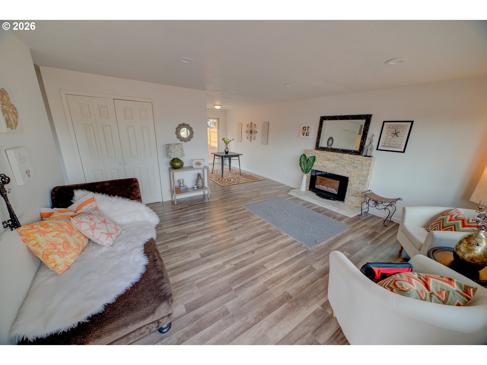 3825 Southwest 198th Avenue Beaverton, OR 97078 - Photo 23 of 23 a living room with furniture and a wooden floor