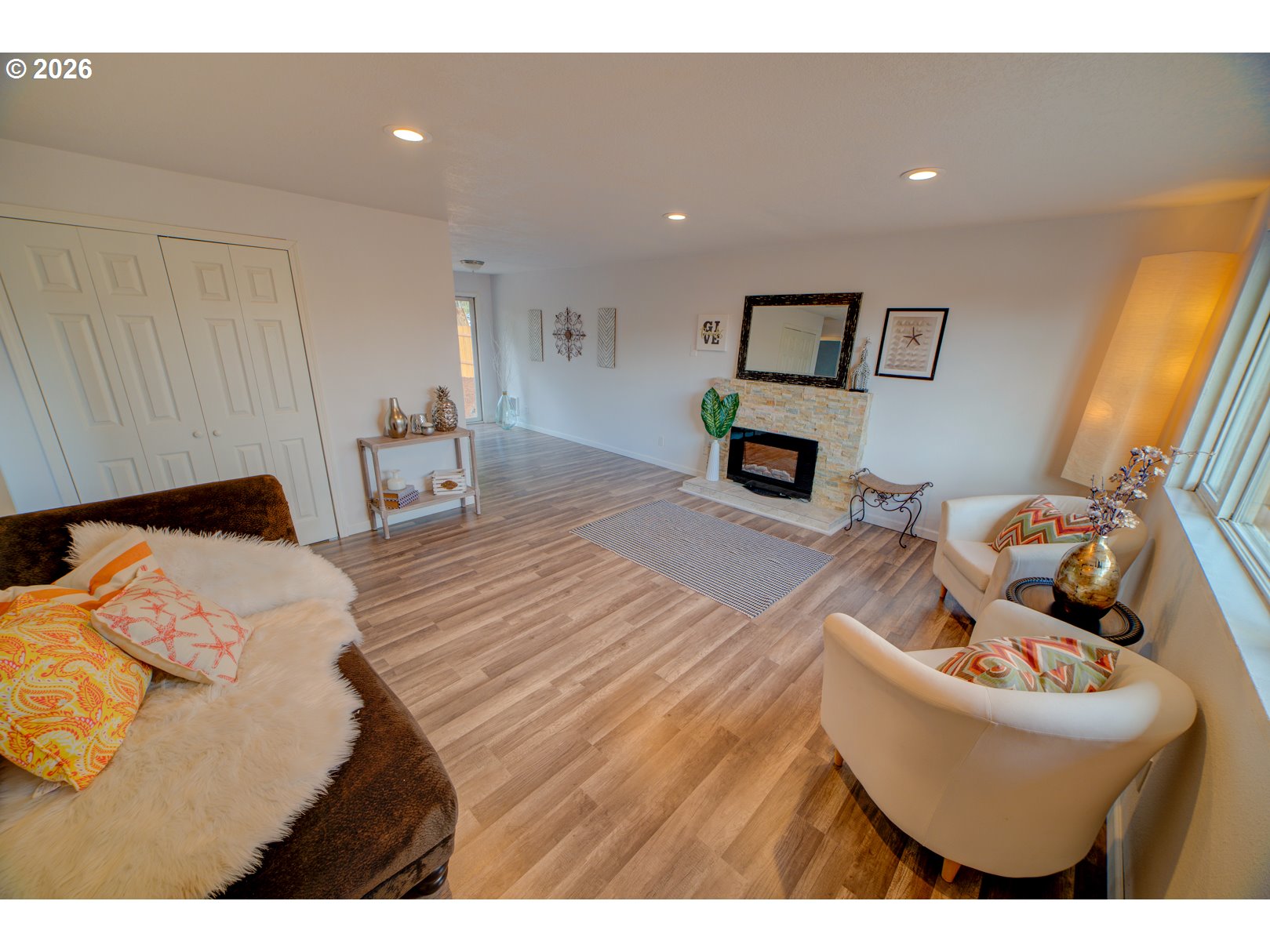3825 Southwest 198th Avenue Beaverton, OR 97078 - Photo 8 of 23 a living room with furniture and a wooden floor
