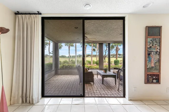a bathroom with a toilet sink and shower