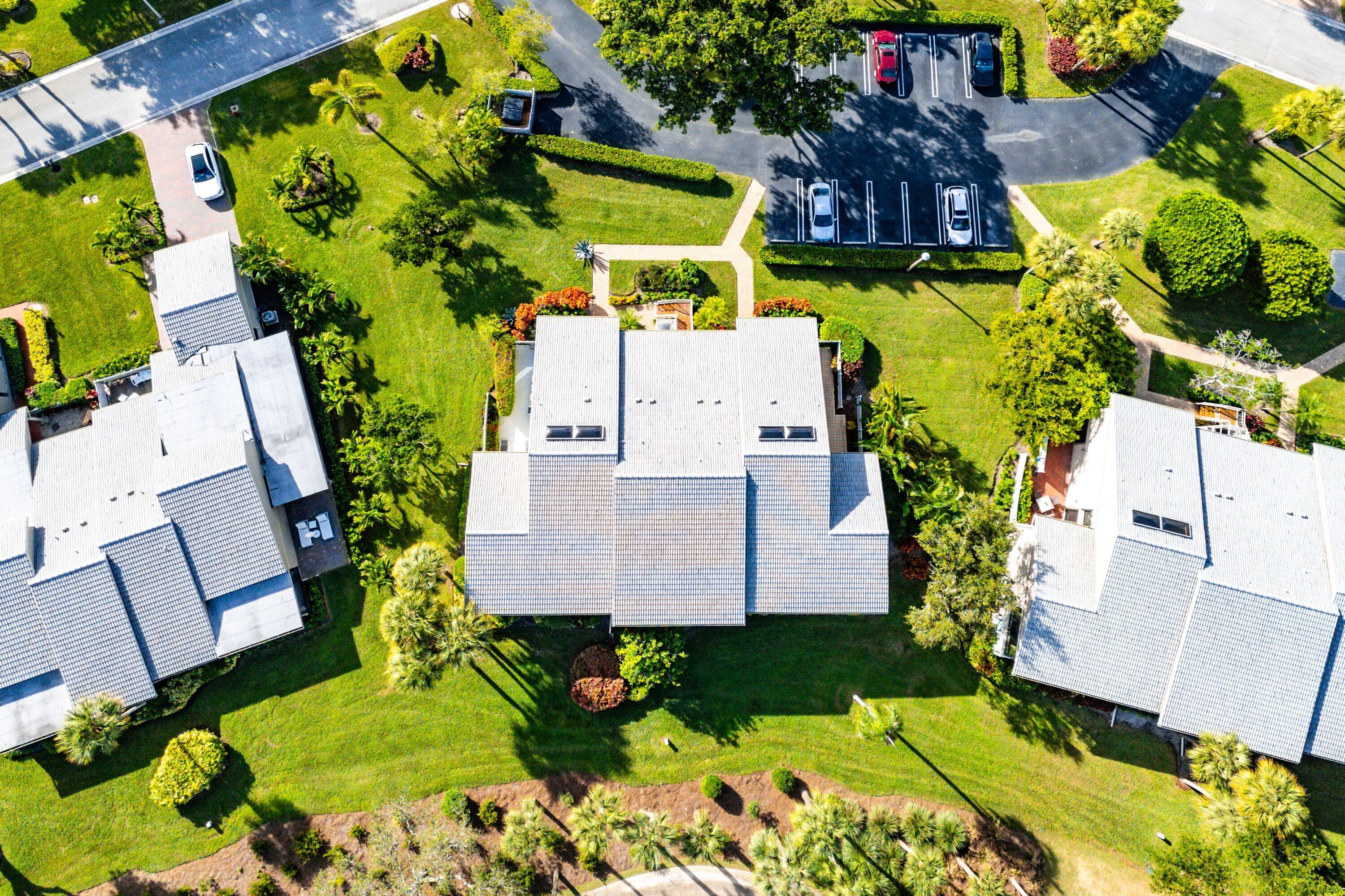 5 Eastgate Drive, Unit A Boynton Beach, FL 33436 - Photo 41 of 49 an aerial view of a house with a yard swimming pool and outdoor seating
