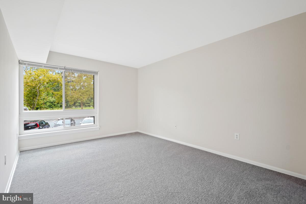 8431 Greenbelt Road Greenbelt, MD 20770 - Photo 4 of 16 an empty room with a window