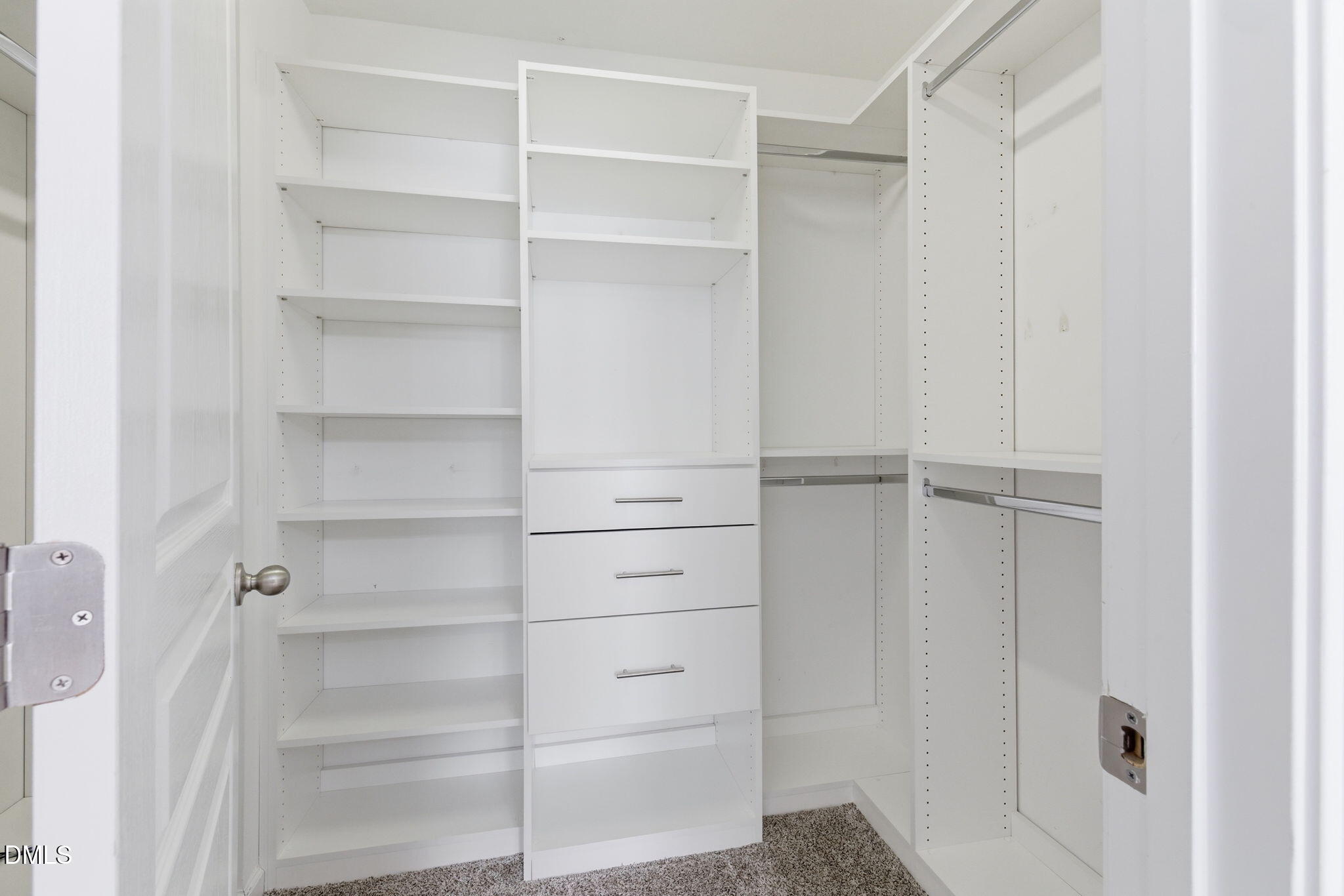 5003 Celtic Court Raleigh, NC 27612 - Photo 30 of 45 a view of walk in closet with empty racks