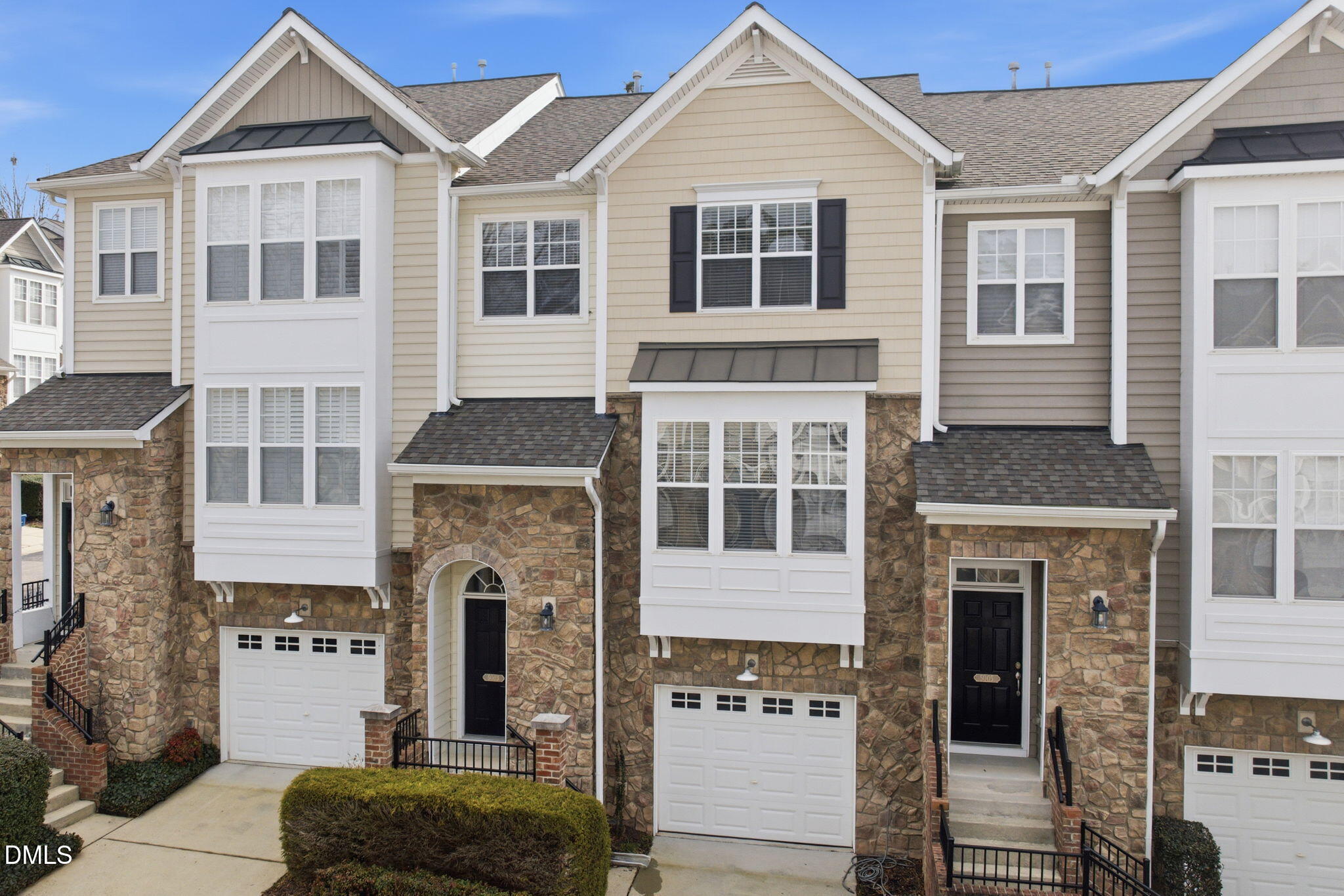 5003 Celtic Court Raleigh, NC 27612 - Photo 3 of 45 a front view of a house with a yard