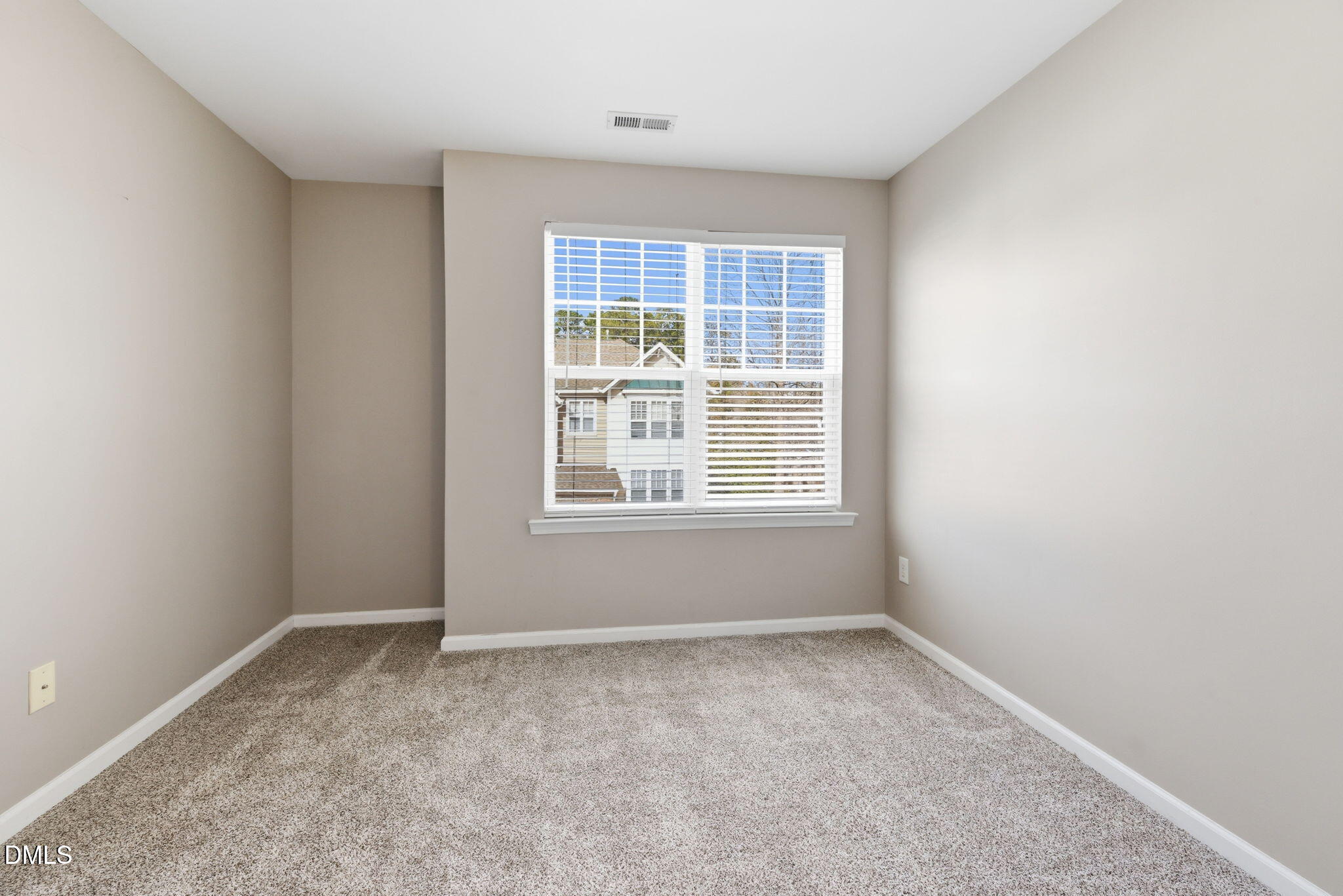 5003 Celtic Court Raleigh, NC 27612 - Photo 32 of 45 an empty room with a window