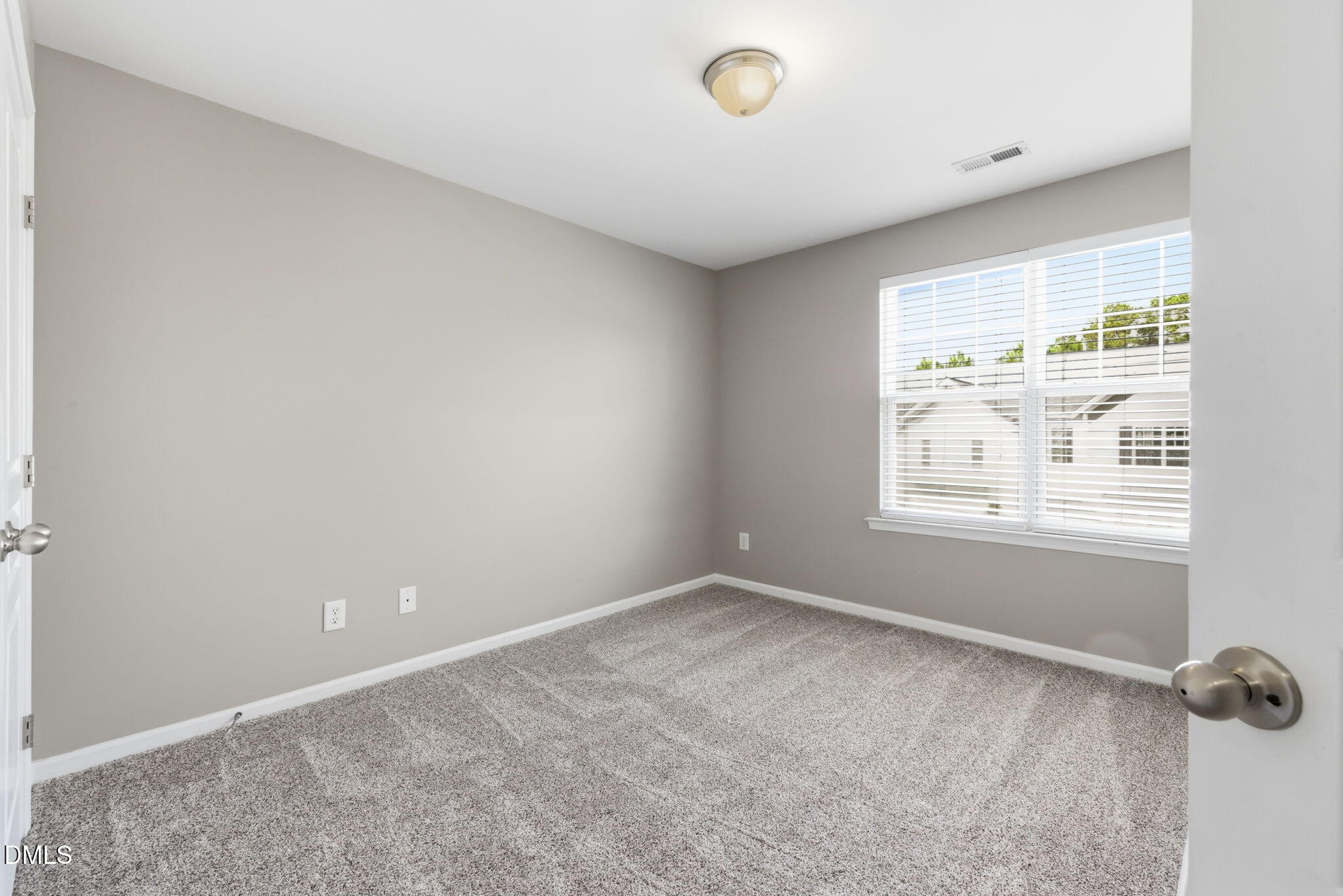 5003 Celtic Court Raleigh, NC 27612 - Photo 33 of 45 an empty room with a window