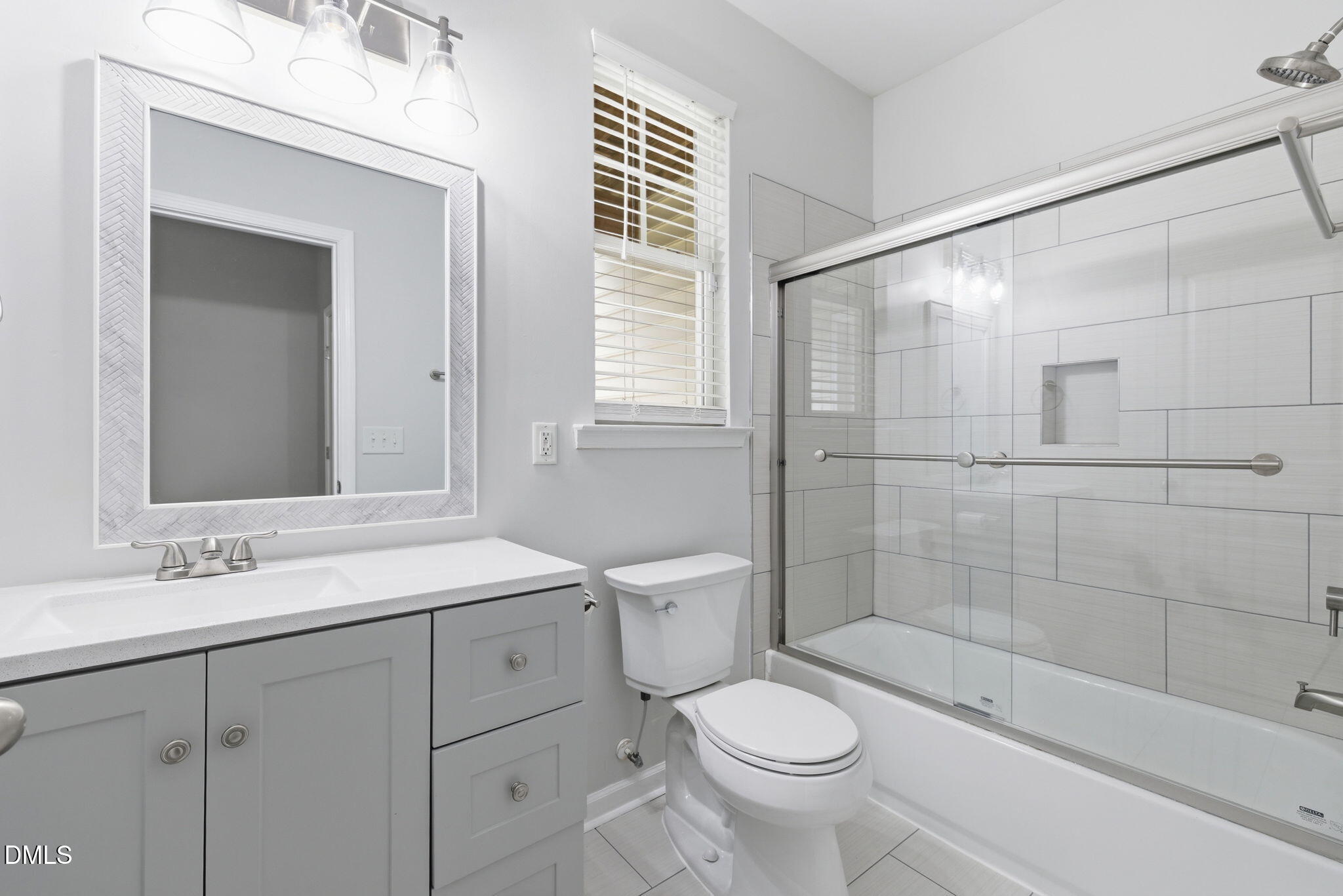 5003 Celtic Court Raleigh, NC 27612 - Photo 40 of 45 a bathroom with a sink a toilet and shower