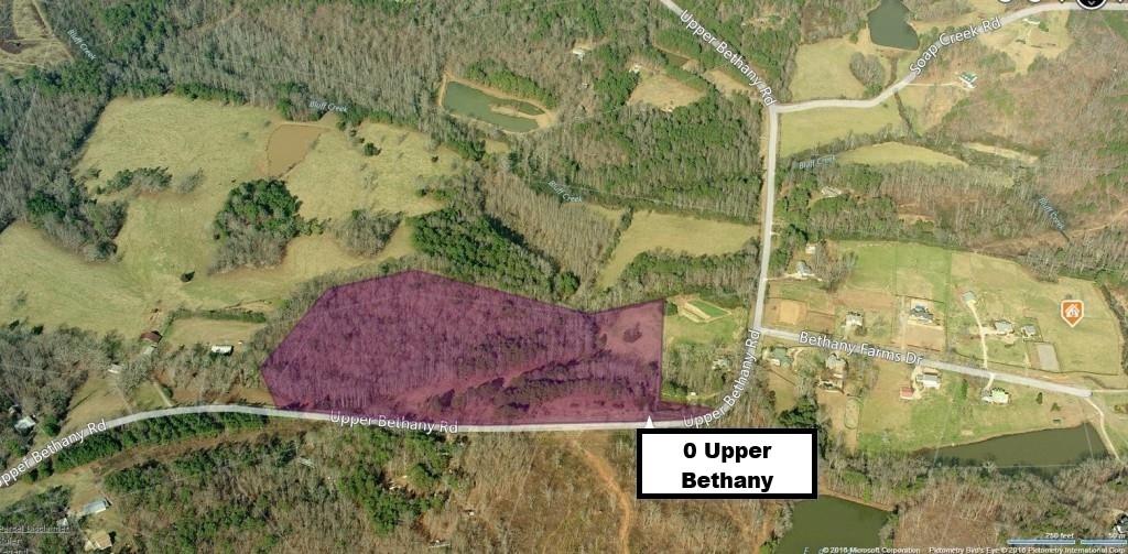 0 Upper Bethany Road Canton, GA 30114 - Photo 3 of 15 a sign that is sitting on a brick wall