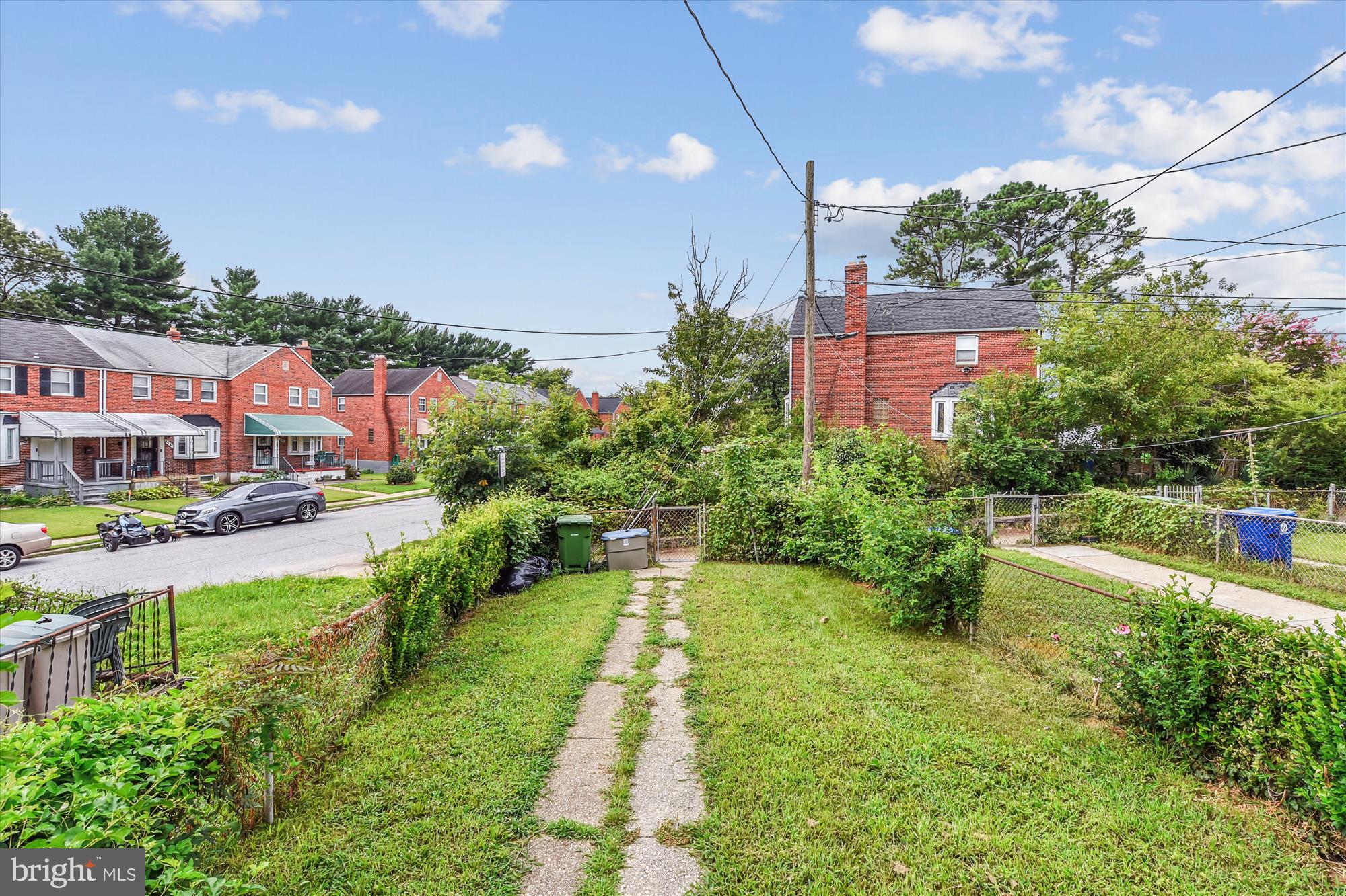 5755 Maplehill Road Baltimore, MD 21239 - Photo 17 of 18 a view of yard with swimming pool and green space