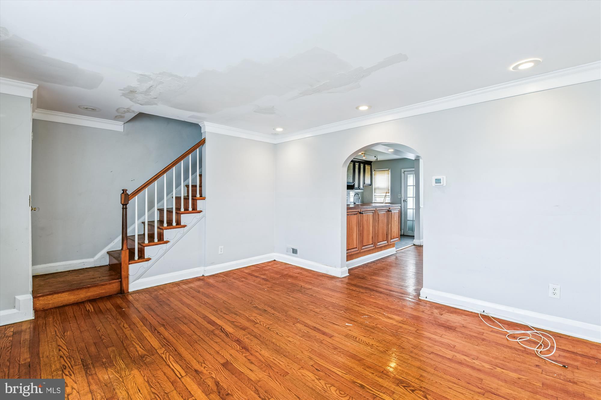 5755 Maplehill Road Baltimore, MD 21239 - Photo 3 of 18 a view of an entryway with wooden floor