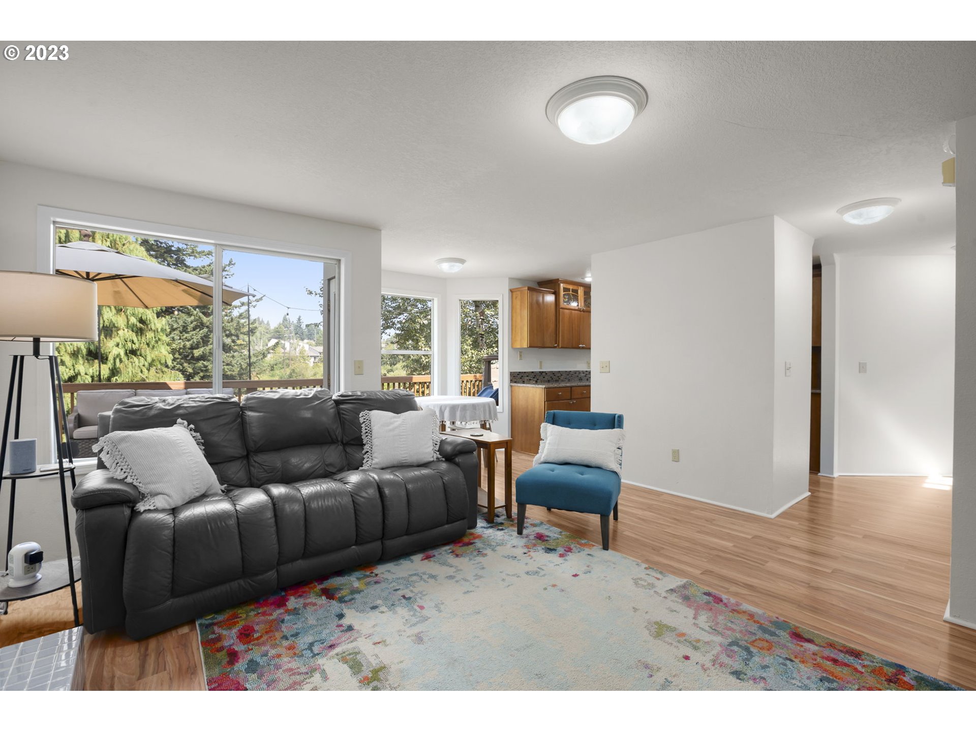 803 Southwest 4th Street Gresham, OR 97080 - Photo 14 of 42 a living room with furniture and a wooden floor