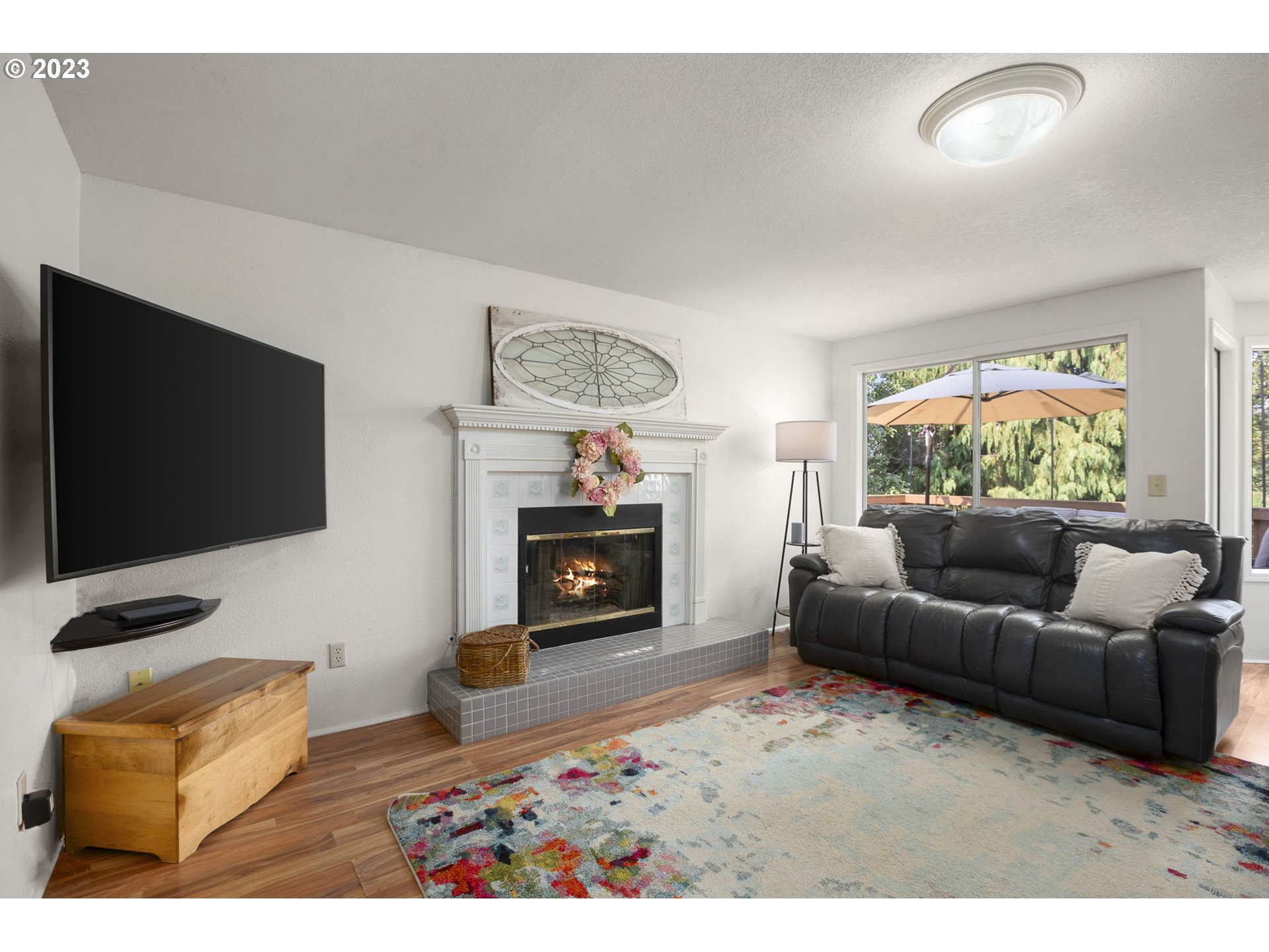 803 Southwest 4th Street Gresham, OR 97080 - Photo 15 of 42 a living room with furniture and a flat screen tv