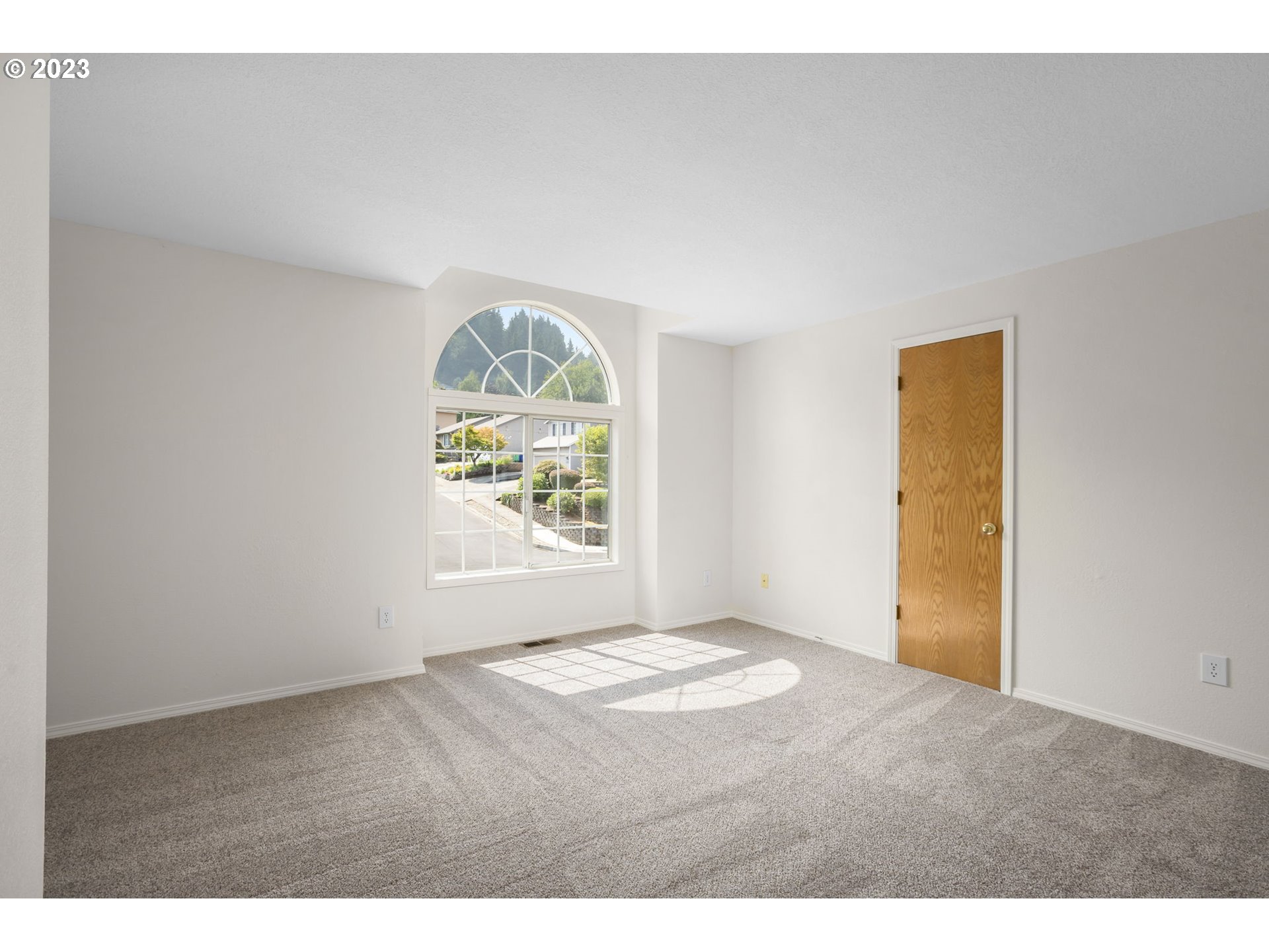 803 Southwest 4th Street Gresham, OR 97080 - Photo 19 of 42 a view of an empty room with a window