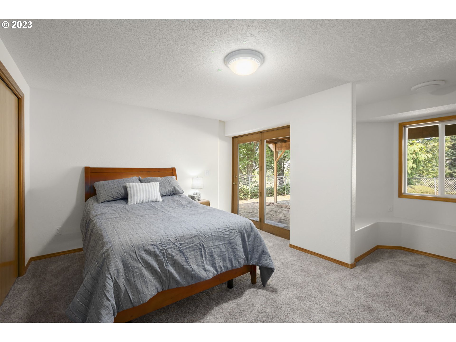 803 Southwest 4th Street Gresham, OR 97080 - Photo 28 of 42 a bedroom with a bed and window