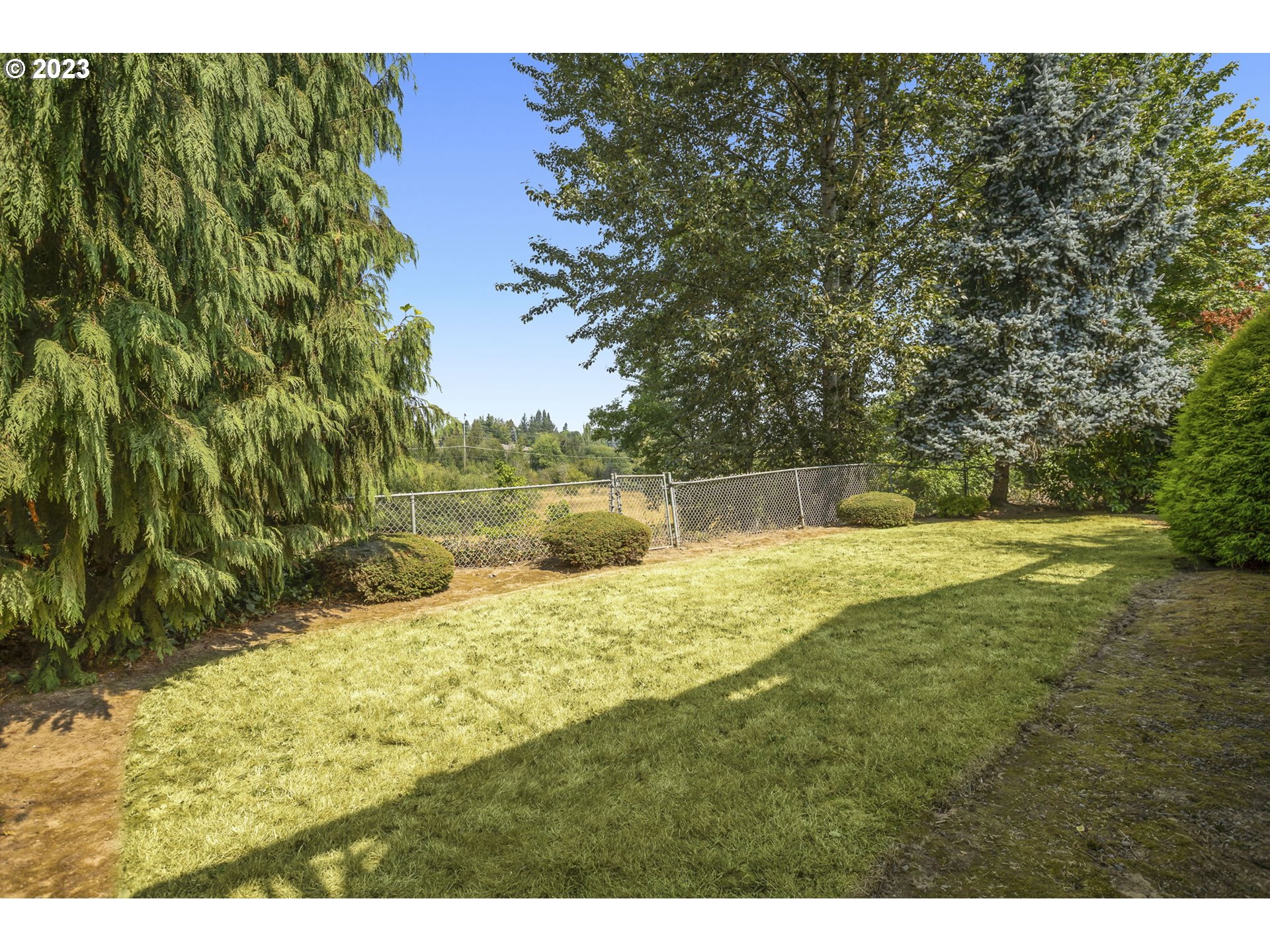 803 Southwest 4th Street Gresham, OR 97080 - Photo 32 of 42 a view of yard with swimming pool and green space