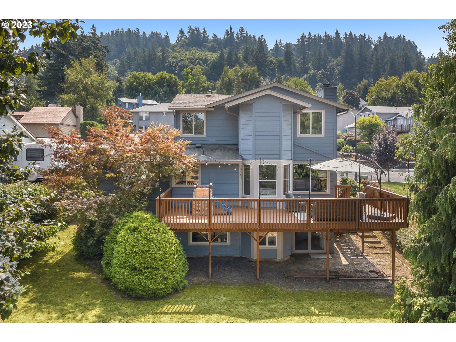 803 Southwest 4th Street Gresham, OR 97080 - Photo 34 of 42 a view of a house with backyard porch and sitting area