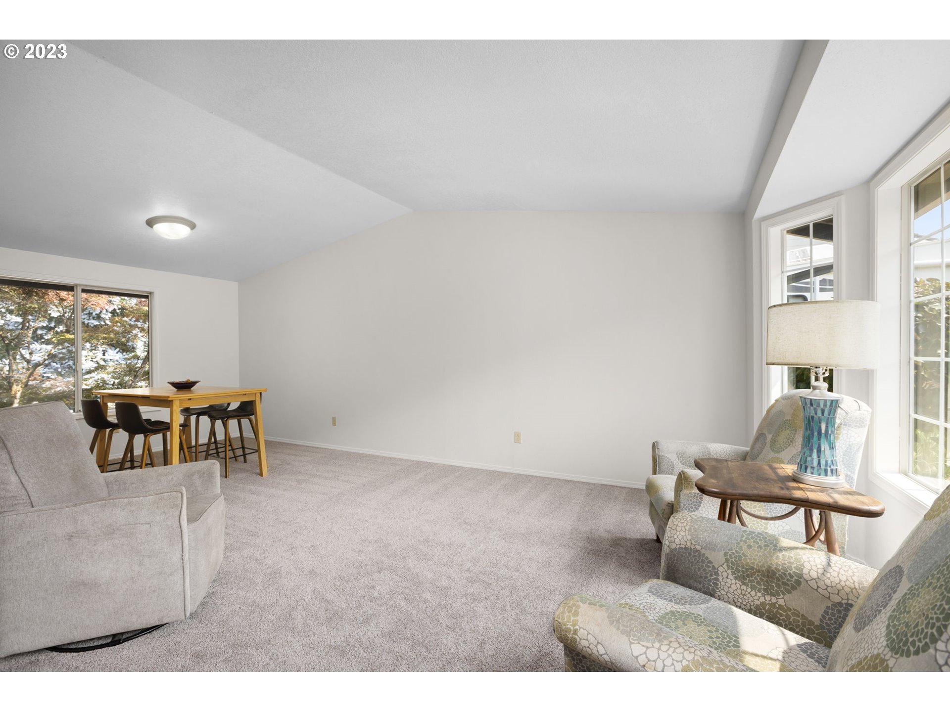 803 Southwest 4th Street Gresham, OR 97080 - Photo 6 of 42 a living room with furniture and a large window