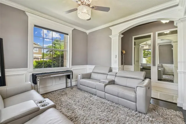a view of a dining room with furniture window and wooden floor