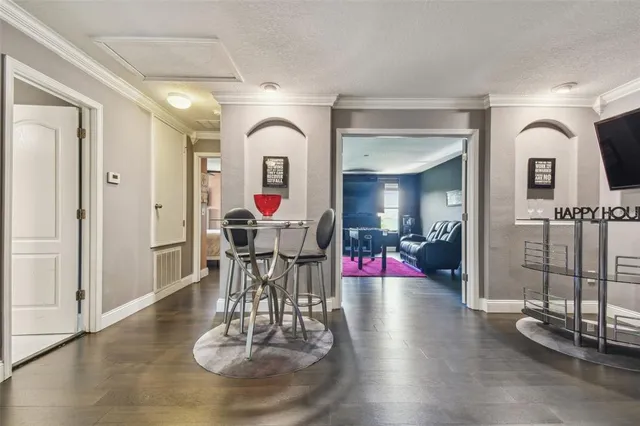 a bathroom with a tub and shower