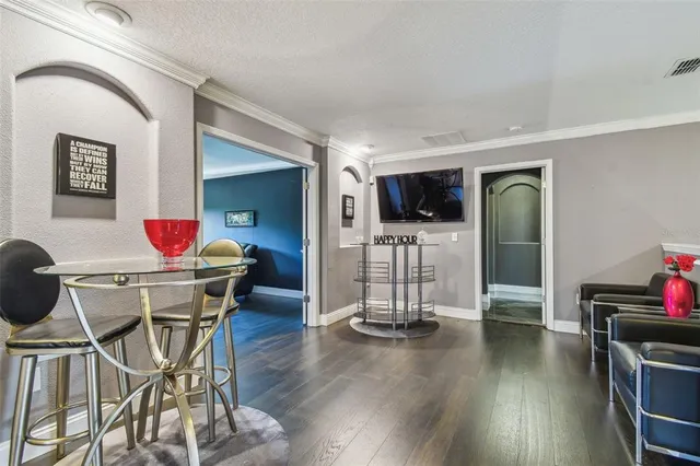 a bathroom with a granite countertop sink a mirror and a shower