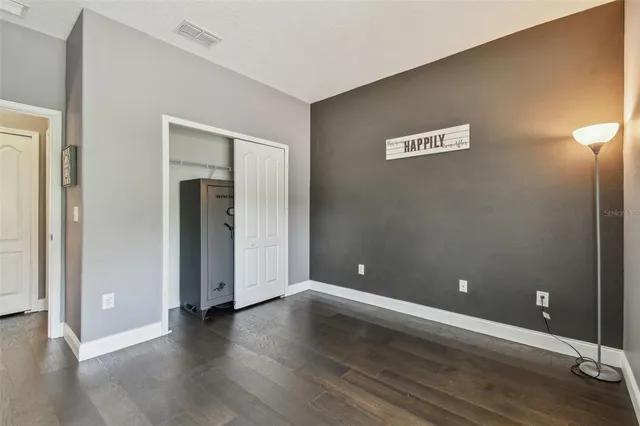 a view of a balcony with couches table and chairs