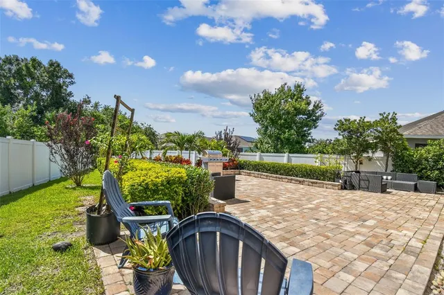 a view of a swimming pool with an outdoor space