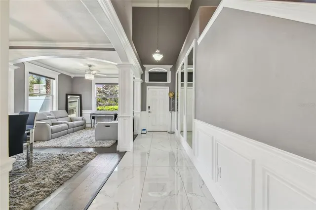 a kitchen with kitchen island granite countertop stainless steel appliances and sink