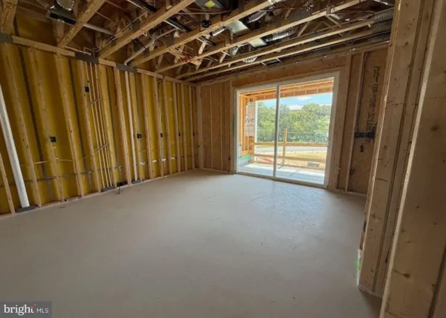 a view of a room with a large window