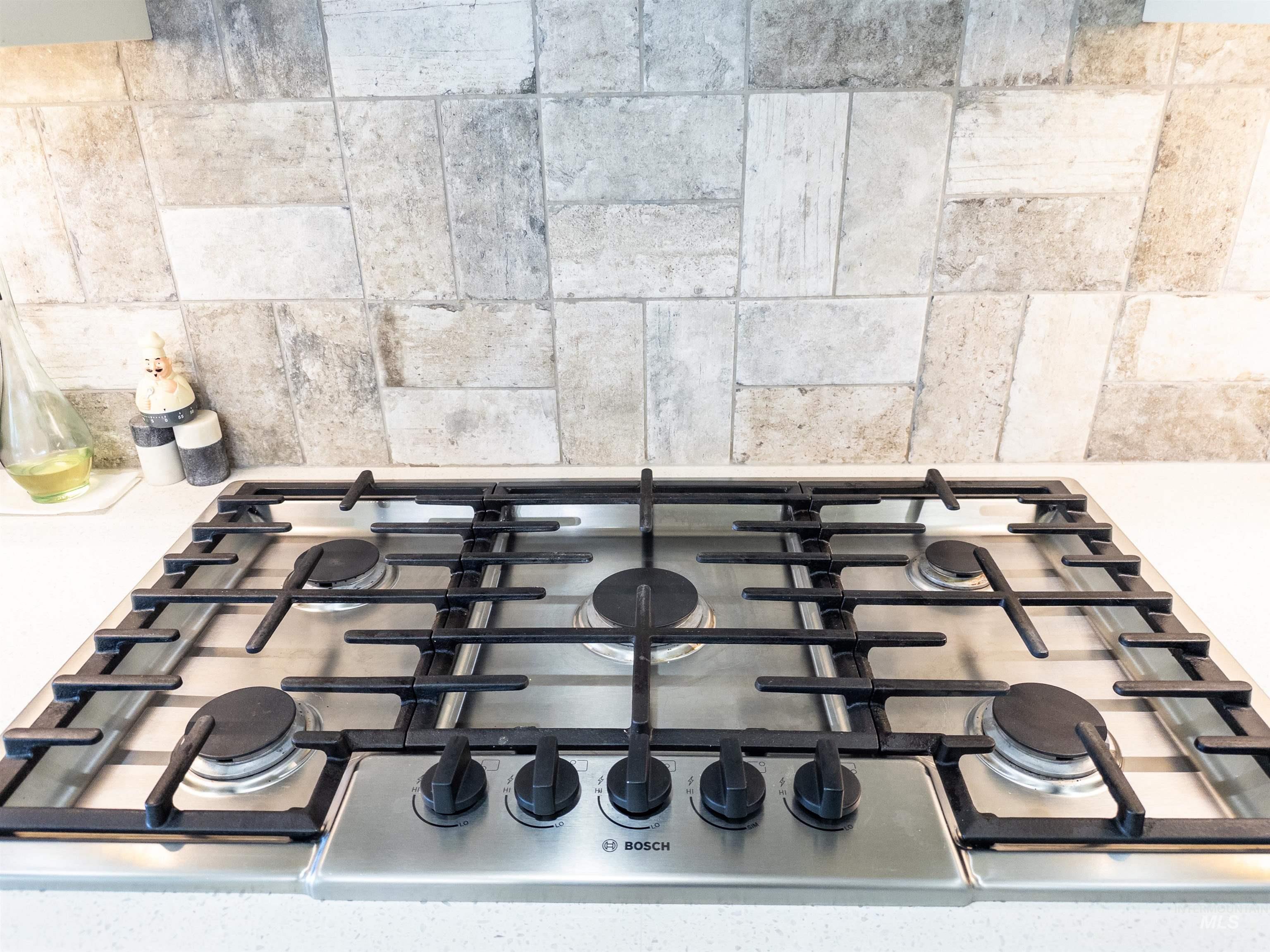 4577 North Comiso Place Meridian, ID 83646 - Photo 12 of 47 Kitchen view of stainless steel gas cooktop