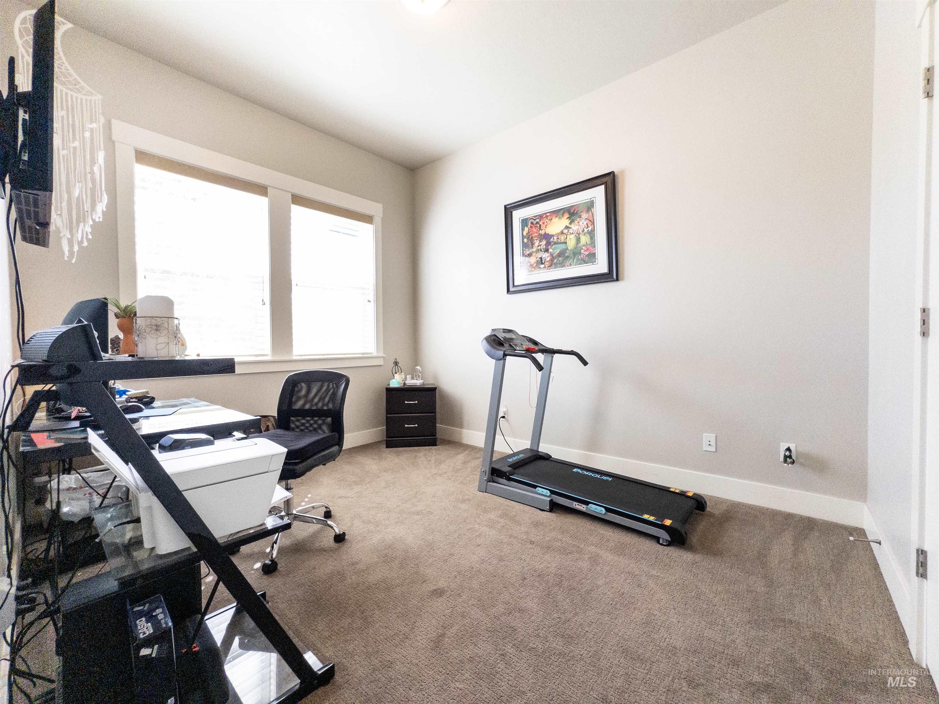 4577 North Comiso Place Meridian, ID 83646 - Photo 17 of 47 Office space featuring carpet floors and baseboards
