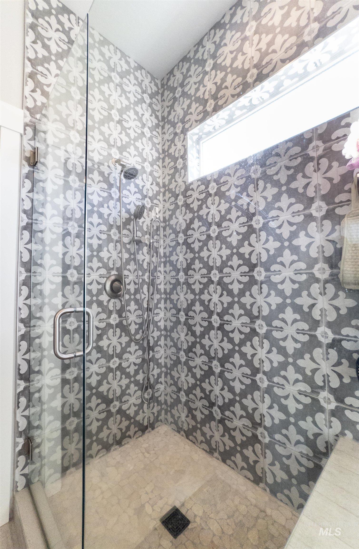 4577 North Comiso Place Meridian, ID 83646 - Photo 27 of 47 Full bathroom featuring a stall shower