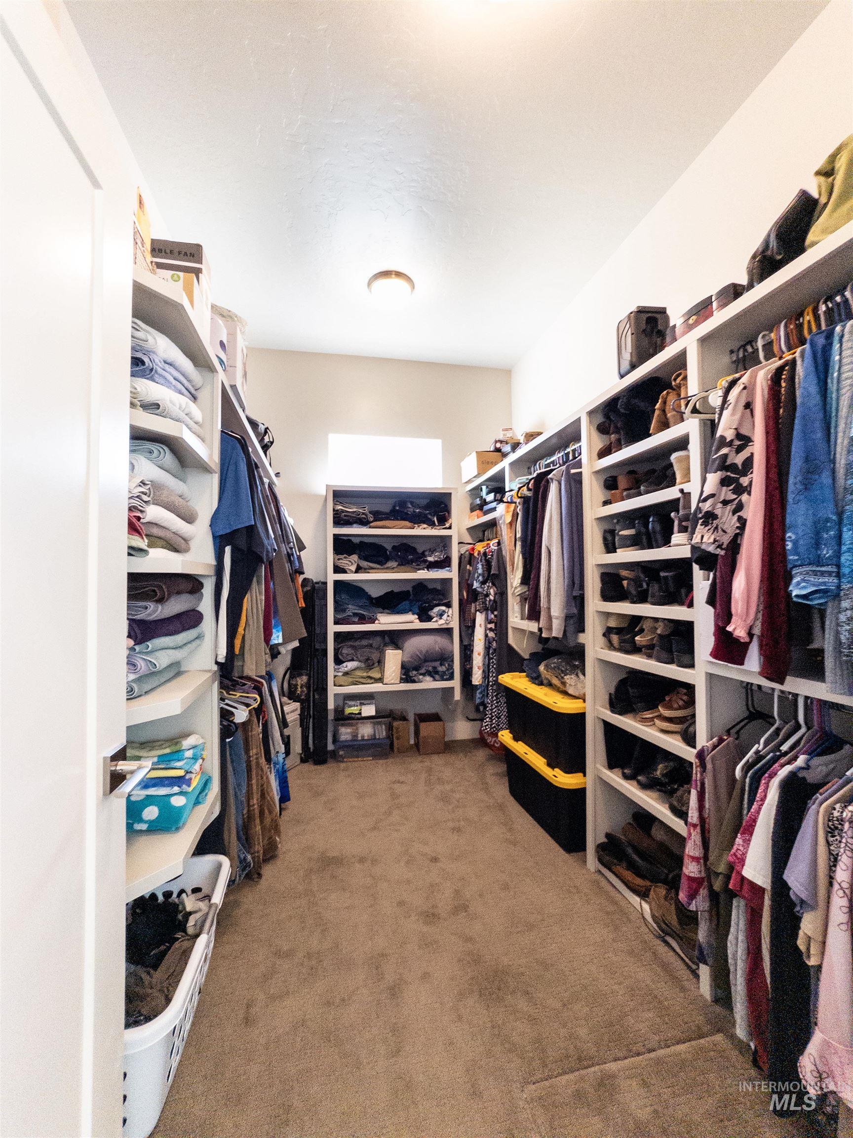 4577 North Comiso Place Meridian, ID 83646 - Photo 29 of 47 Walk in closet with light carpet