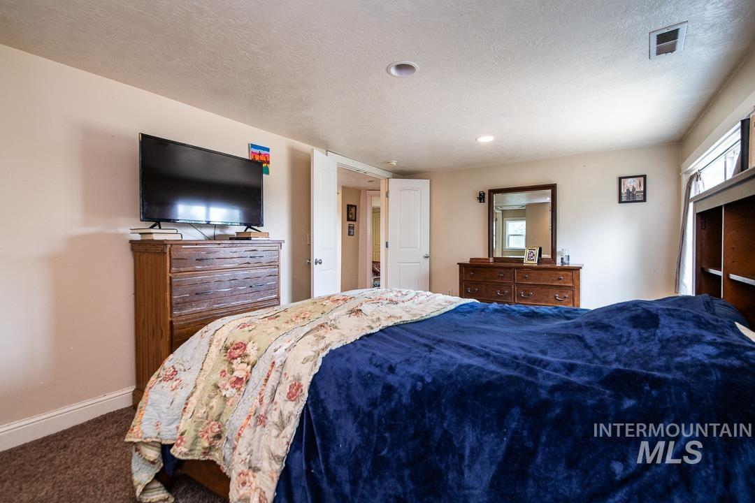 595 Cemetery Road Cambridge, ID 83610 - Photo 26 of 47 Neutral wall color complemented by white trim and doors
